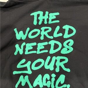 Dressed in LALA Black Sweatshirt with Green Message